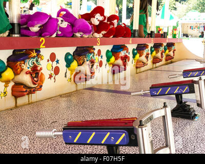 Arcade Sharpshooter Game with Clown Theme in Central Park, NYC Stock Photo