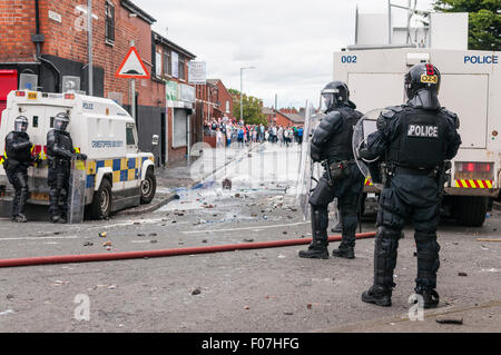 Belfast, Northern Ireland. 09 Aug 2015 - The ground is littered with debris after nationalist youths, some as young as 8, throw bricks, paint, bottles and petrol bombs at PSNI following an anti-internment rally. Credit:  Stephen Barnes/Alamy Live News Stock Photo