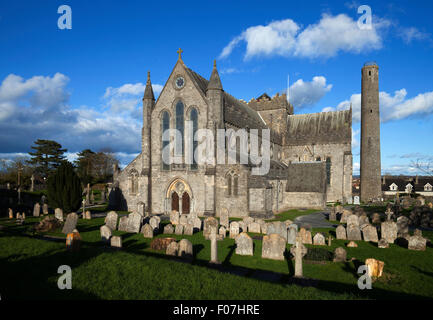 13th Century St Canice's Cathedral, with its 11th Century Celtic Christian Round Tower (can still be climbed), Kilkenny City, Ireland Stock Photo