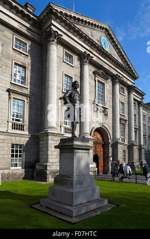 Sculpture of Edmund Burke in Front of  Regency House and Main Gate, College Green Entrance to Trinity College, Dublin, Ireland Stock Photo