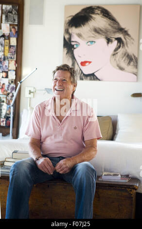 Malibu, California, USA. 23rd Aug, 2010. Ryan O'Neal, an American television and film actor, photographed in his Malibu beach house a year after the death of his longtime companion, actress Farrah Fawcett (died in 2009 of cancer). In 2013 Ryan O'Neal wins custody of Farrah Fawcett portrait created by Andy Warhol in 1980, which hangs above his bed in his bedroom. (Portrait received various value estimates ranging from $800,000 to $12 million.)The ''Charlie's Angels'' star left all her artwork to her alma mater, the University of Texas at Austin; her gift included another version of the Warhol Stock Photo