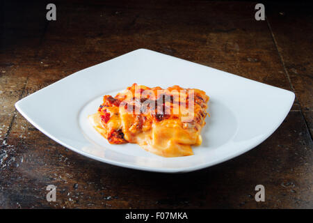 Italian Lasagna, italian food, italian cooking in a pot isolated Stock Photo