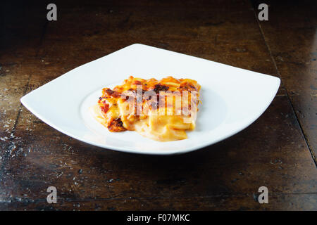 Italian Lasagna, italian food, italian cooking in a pot isolated Stock Photo