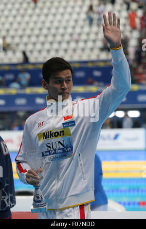 Kazan, Russia. 9th Aug, 2015. China's Sun Yang gestures to spectators after being awarded as the best male swimmer of the 2015 FINA World Championships in Kazan, Russia, Aug. 9, 2015. © Meng Yongmin/Xinhua/Alamy Live News Stock Photo