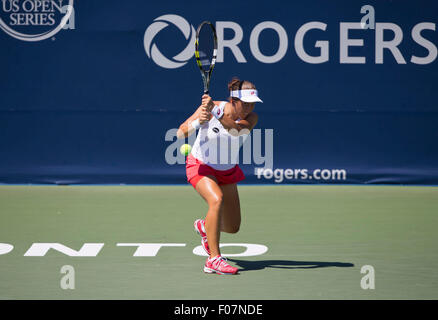 Toronto, Canada. 9th Aug, 2015. Olga Govortsova of Belarus returns the ball against Julia Glushko of Israel during the second round of women's singles qualifying match at the 2015 Rogers Cup in Toronto, Canada, August 9, 2015. Olga Govortsova won 2-1. Credit:  Zou Zheng/Xinhua/Alamy Live News Stock Photo