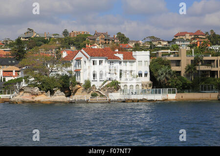 Picturesque waterfront buildings at Point Piper, entrance to Rose Bay, Sydney, New South Wales, Australia. Stock Photo