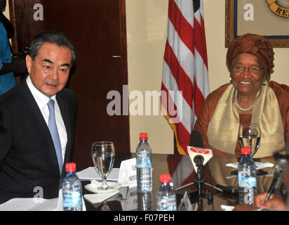 Monrovia, Liberia. 9th Aug, 2015. Liberian president Ellen Johnson Sirleaf (R) meets with visiting Chinese Foreign Minister Wang Yi in Monrovia, capital of Liberia, Aug. 9, 2015. © Zhang Baoping/Xinhua/Alamy Live News Stock Photo