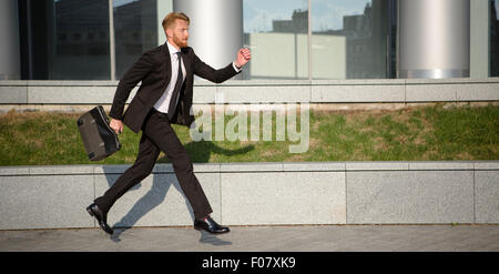 Businessman in hurry Stock Photo