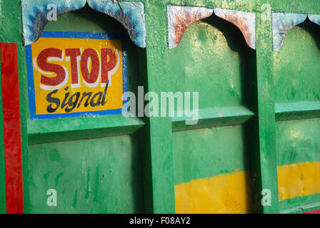 Signs on back of green lorry, Mumbai, Maharashtra, India. Stock Photo