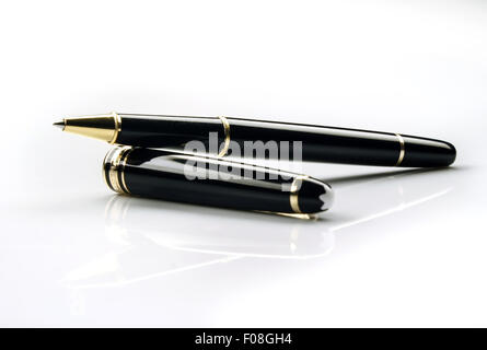 A black ballpoint pen isolated on a white background. Stock Photo