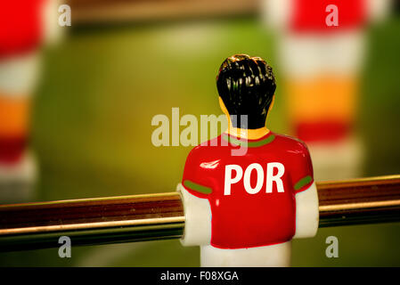 Portugal National Jersey on Vintage Foosball, Table Soccer or Football Kicker Game, Selective Focus, Retro Tone Effect Stock Photo