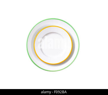 Dinner plate and side plate with colored edges isolated on white Stock Photo
