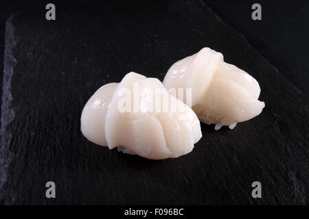 two sushi on flat slate, black background Stock Photo