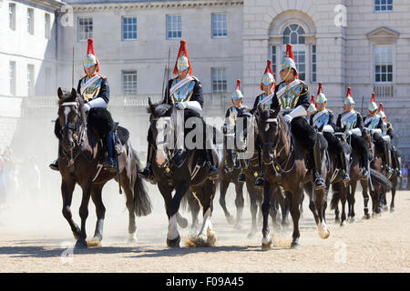 Blues and royals household Cavalry leaving Horseguards Parade for the changing of the guards in London Stock Photo