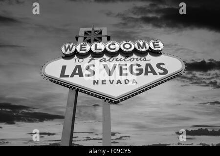 Las Vegas welcome sign with sunrise sky in black and white.
