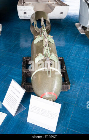 World war two British 250 lb bomb on display in the Spitfire memorial museum at Manston. Red band around nose of bomb. Stock Photo