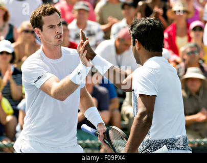 Montreal, Canada. 10th Aug, 2015. Britain's Andy Murray (L) encourage partner India's Leander Paes during the men's first round doubles match against South Africa's Kevin Anderson and Jeremy Chardy of France at the Rogers Cup at Uniprix Stadiumin Montreal, Canada, Aug. 10, 2015. Credit:  Andrew Soong/Xinhua/Alamy Live News Stock Photo