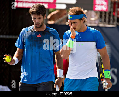 Montreal, Canada. 10th Aug, 2015. Spain's Fernando Verdasco/Rafael Nadal(R) react during the men's first round doubles match against Tomas Berdych of the Czech Republic and Jack Sock of the United States at the Rogers Cup at Uniprix Stadiumin Montreal, Canada, Aug. 10, 2015. Credit:  Andrew Soong/Xinhua/Alamy Live News Stock Photo