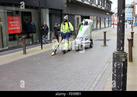 https://l450v.alamy.com/450v/f09rr1/male-operative-using-a-glutton-electric-waste-street-vacuum-cleaner-f09rr1.jpg