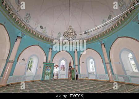 man praying inside Juma Mosque  Quba Azerbaijan Stock Photo