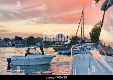 Boats moored at marina in Mikolajki, Warmia-Masuria, Poland Stock Photo