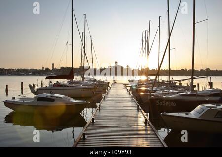 Boats moored at marina in Mikolajki, Warmia-Masuria, Poland Stock Photo