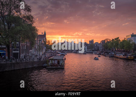 View of the River Amstel in Amsterdam at sunset Stock Photo