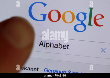 Schwerin, Germany. 11th Aug, 2015. ILLUSTRATION - An illustration shows the term 'Alphabet' on a screen displaying the website of search engine Google in Schwerin, Germany, 11 August 2015. The technology company will be scaled down and operate under a newly created umbrella company named Alphabet in a bid to reorganize its corporate structure. Photo: JENS BUETTNER/dpa/Alamy Live News Stock Photo