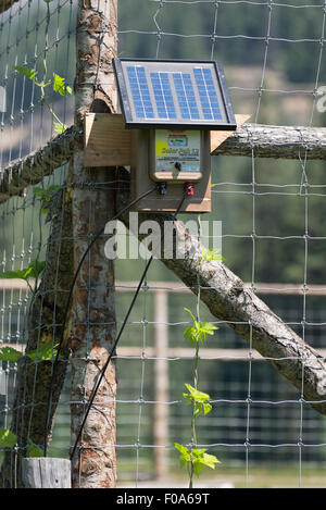 Solar panel powering electric fence at the Minam River lodge in Oregon's Wallowa Mountains. Stock Photo