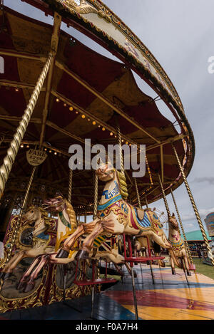 A picture of a beautiful Carousel which are still enjoyed by young and old people today ,with beautiful and bright colours Stock Photo