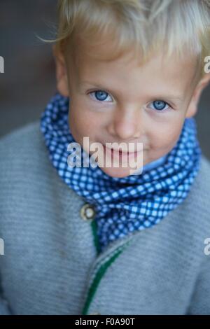 Portrait of cute boy with blue eyes