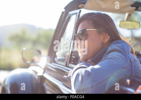 Mature woman in convertible car Stock Photo