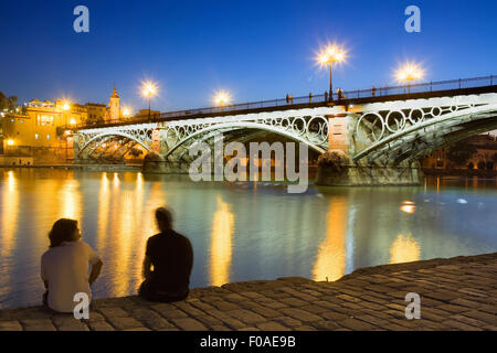 Isabel II bridge or Triana bridge, in Guadalquivir river,Sevilla,Andalucía,Spain Stock Photo