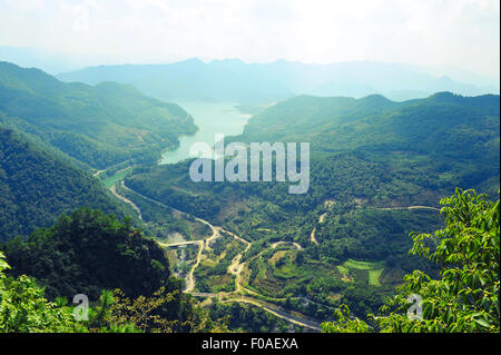View of green river and mountains, looking down from top of the mountain, Hangzhou, China Stock Photo