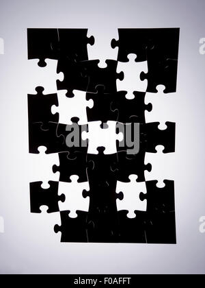 Rectangular jigsaw puzzle partly solved Stock Photo