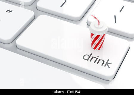 Plastic cup and straw on the computer keyboard. Rest time concept Stock Photo