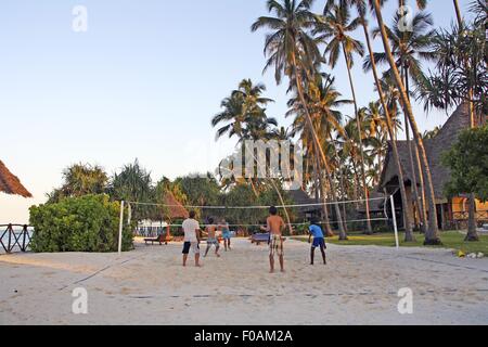 People playing volley ball on beach of Zanzibar, Tanzania, East Africa Stock Photo