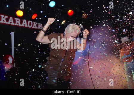 Singer performing in Anti-Karaoke Show at Sala Apolo, Barcelona, Spain Stock Photo