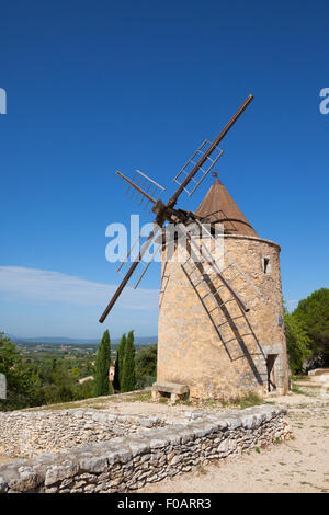 Old stone windmill in Saint Saturnin les Apt, Provence, France Stock Photo