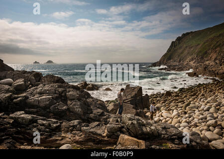 Massive rounded boulders on the beach at Porth Nanven, Penwith, Cornwall, UK Stock Photo