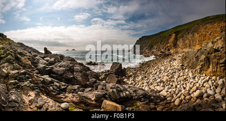 Massive rounded boulders on the beach at Porth Nanven, Penwith, Cornwall, UK Stock Photo