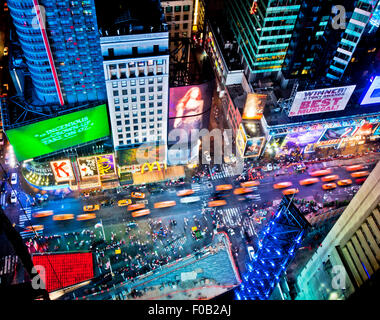 NEW YORK, USA - JUNE 29th, 2014: Aerial view of Times Square the popular New Year's Eve destination with crowds and taxi cabs in Stock Photo