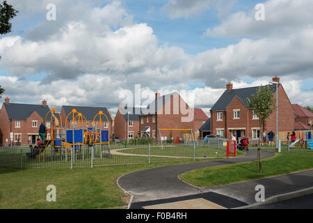 Children's playground in Middlemoor Housing Estate, Daventry, Northamptonshire, England, United Kingdom Stock Photo