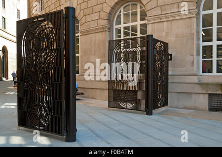 The newly installed (2015) gates at the Mount Street entrance to Library Walk, Manchester, England, UK. Stock Photo