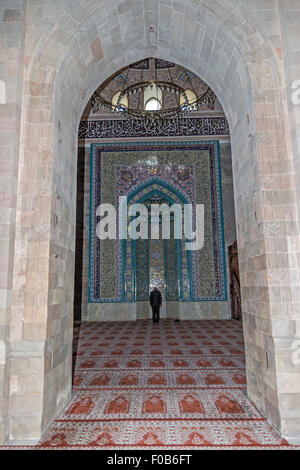 male praying, Interior, Mihrab, Juma (Friday) Mosque of Shamakhi, Azerbaijan. 1st mosque in the Caucasuses Stock Photo