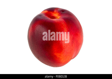 Close-up of a whole ripe nectarine/peach (Prunus persica) isolated on white background. Stock Photo
