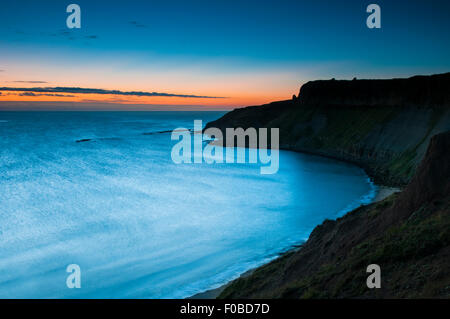 Dawn at Cayton Bay, North Yorkshire. August. Stock Photo