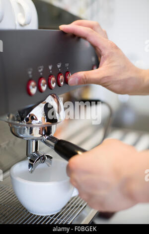 Barista making coffee Stock Photo