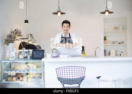Portrait of coffee shop owner Stock Photo