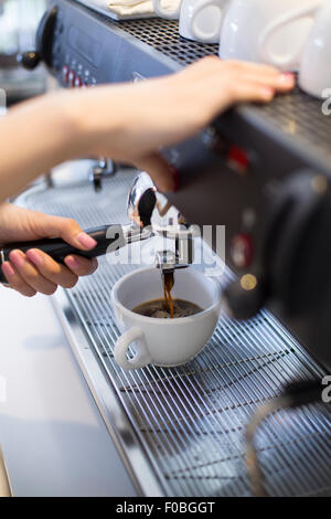 Barista making coffee Stock Photo
